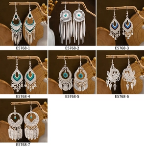 Detailed collection of ethnic bohemian tassel earrings in silver finish and colorful oil drip