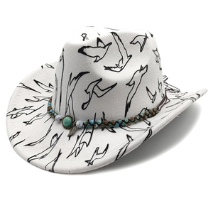 White Western cowboy hat with black bird graffiti and turquoise beaded band detail