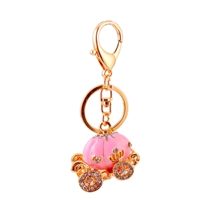 Pink pumpkin carriage keychain with gold plating and sparkling crystals for women