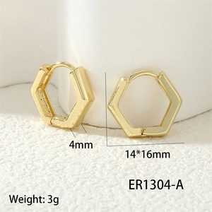 Detailed view of golden hexagonal earrings with 14x16mm dimensions and polished finish