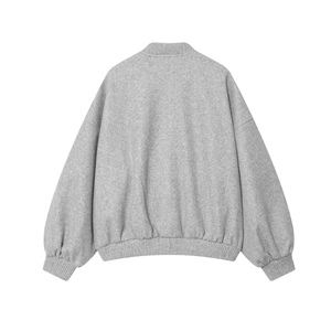 Back view of a grey loose-fit bomber jacket with ribbed collar and textured wool blend fabric