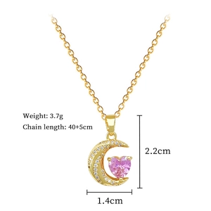Detail of crescent moon necklace with pink heart gem and crystal paving measurements