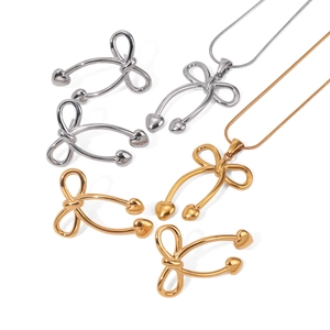 Sleek stainless steel bow necklace and pendant set in gold and silver finishes