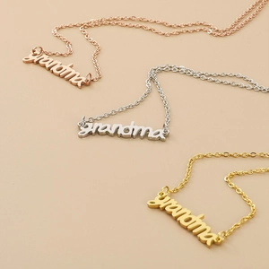 Three Grandma letter pendants in rose gold, silver, and gold stainless steel finish