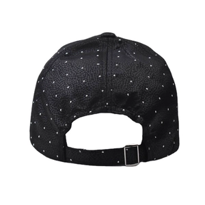 Detail view of the black snake texture baseball cap with silver metal studs and buckle