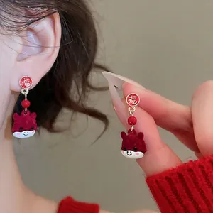 Chinese style red flocking zodiac earrings with Fu character enamel and tassels