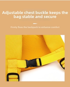 Detail of adjustable chest buckle on yellow bee backpack for toddler safety and stability