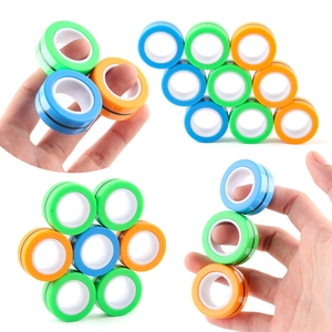 Magnetic fidget ring toy set in blue, green and orange for finger spin and stress relief