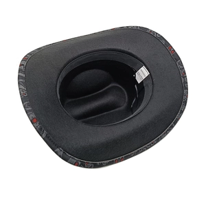 Black cowboy hat with skull pattern and interior view showing 100% polyester wash label