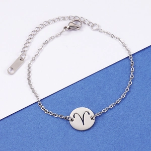 Bracelet bélier minimaliste en acier inoxydable avec pendentif rond découpé sur fond bicolore