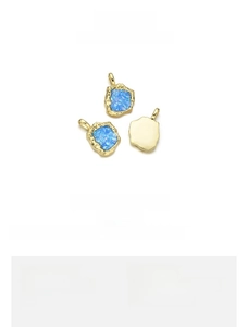 Detail of an irregular geometric 18K gold-plated opal pendant measuring 15x21mm and 2.5g