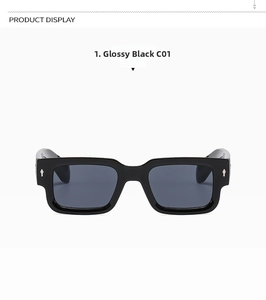 Détail de lunettes de soleil noires carrées avec des ornements en métal argenté