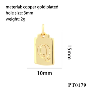 Detailed view of golden rectangle copper charm with engraved letter Q and dimensions