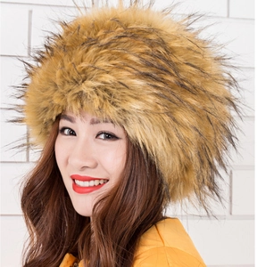 Close-up of fluffy faux fox fur texture on a warm Russian style winter cossack hat