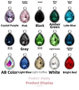Macro shot of assorted water drop alloy pendants in 20 vibrant crystal colors