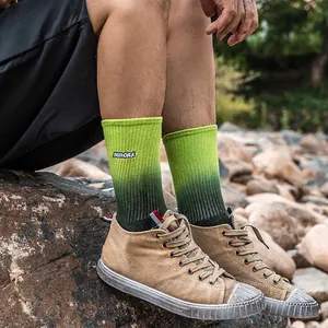 Gradient green cotton socks with Aurora embroidery paired with khaki canvas shoes