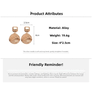 Detail view of gold hammered round earrings with 19.6g weight and 4x2.5cm size specs