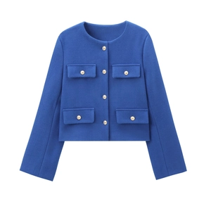 Detail of royal blue tweed jacket featuring round neck and five gold metallic buttons