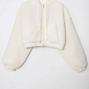 Women's white sherpa fleece hooded jacket with full zipper and short cropped fit
