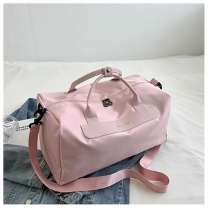 Pink waterproof yoga bag with detachable shoulder strap and Happy BAG leather patch