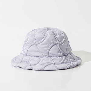 Detail view of the wave-quilted lavender satin texture on this warm winter bucket hat