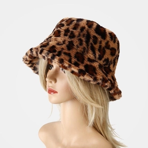 Close-up of leopard print faux fur bucket hat showing soft plush texture and pattern