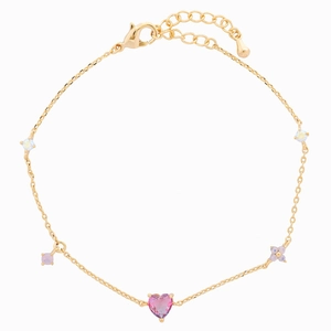Golden bracelet with pink heart gemstone and floral accents on a clean white background