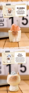 Vertical detail of cat-shaped diffuser jars with Himalayan salt and blue quartz stones