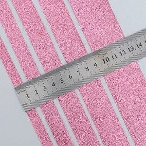 Pink glitter polyester ribbons in various widths for gift boxes and holiday decoration