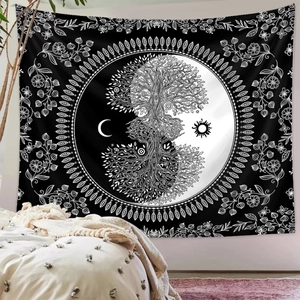 Detail of black and white tree of life tapestry with sun and moon for bedroom wall