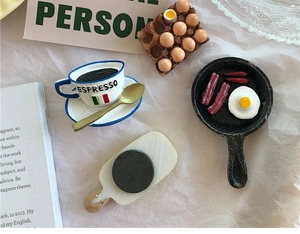 Macro detail of creative 3D espresso and egg frying pan resin fridge magnets with back magnet