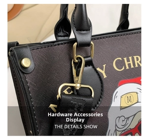 Close-up of golden hardware hooks and D-rings on a Christmas leather tote bag