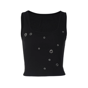 Close-up of black ribbed tank top featuring decorative silver metal eyelets on the front