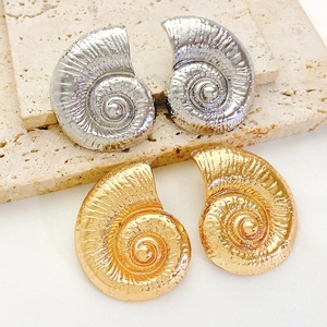 Bohemian style conch shell stud earrings in gold and silver finish for beach holidays