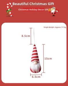 Close-up of a festive knitted Tomte gnome ornament with red and white striped hat