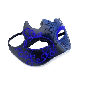 Detail of masquerade half mask with blue glitter scroll patterns and black elastic band