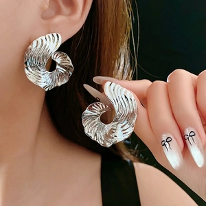 Chic silver oversized round earrings with spiral textured stripe design for women