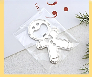 Silver gingerbread man bottle opener in transparent OPP bag packaging for retail
