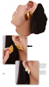 Detailed close-up of geometric wing earrings in gold, brown, and white 18k plated finishes