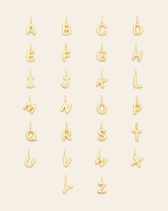Full set of A-Z gold plated bubble letter pendants in a clean 6x4 grid layout
