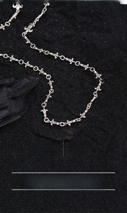 Detail of vintage iris flower link necklace in silver plated copper, length 46.5cm