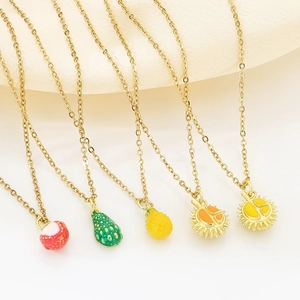 Gold titanium steel necklaces featuring colorful enamel strawberry and avocado fruit pendants
