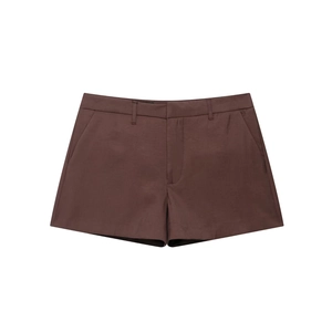 Minimalist dark brown tailored shorts in a flat lay view on a clean white background