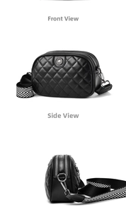 Detail view showing black quilted crossbody bag with wide geometric strap and metal logo