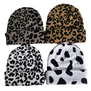 Winter knit beanies set featuring leopard and cow patterns in four colors for warmth