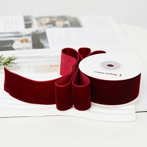 Premium burgundy velvet ribbon roll for Christmas gift wrapping and luxury decor