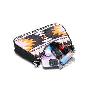 Interior view showing the storage capacity of Aztec bohemian shoulder bag with daily items