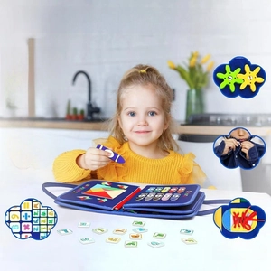 Detail of Montessori busy board with puzzle, clock and fine motor skill modules for kids