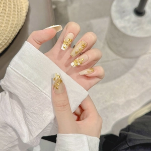 French tip coffin press-on nails with 3D gold floral relief and foil detailing