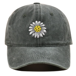 Detailed close-up of white daisy embroidery on vintage washed grey cotton baseball cap